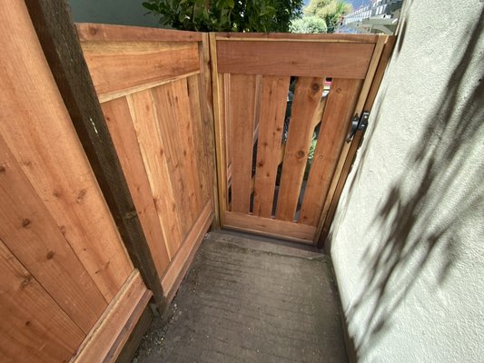 Custom redwood fence - SPR Landscaping call us for next project  at 5102098466