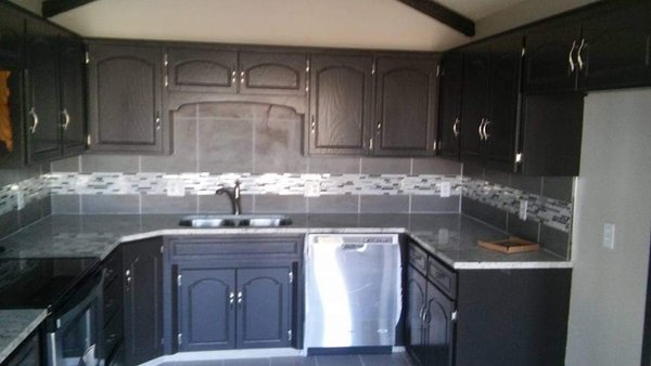 Kitchen Remodel - This was a complete kitchen remodel including plumbing, cabinets, countertops, sink, paint and tile flooring. Kitchen Remodel - This was a complete kitchen remodel including plumbing, cabinets, countertops, sink, paint and tile flooring.