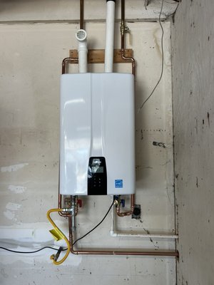 Tankless Water Heater Installation – Navien Upgrade - Removed the existing tank water heater and installed a new Navien high-efficiency tankless water heater with new water, gas, venting, and condensate connections. The system was tested to ensure safe, reliable operation. Eligible homeowners may also qualify for available energy rebates. Call us to learn more.