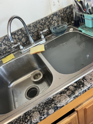 Snake-rooter Kitchen Sink Drain - The kitchen sink appeared to be clogged and overflowing. We performed a snake-rooter to clear the kitchen sink drain and get it up and running. Snake-rooter Kitchen Sink Drain - The kitchen sink appeared to be clogged and overflowing. We performed a snake-rooter to clear the kitchen sink drain and get it up and running.