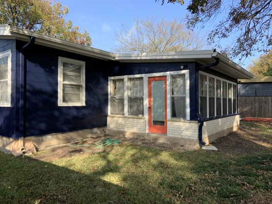 S. Austin color change - This house in a trendy, S. Austin neighborhood desperately needed a refresh. The homeowners selected a cool new color scheme and we went to work cleaning, caulking, and repairing the exterior wood before applying 2 coats of paint. What a change!