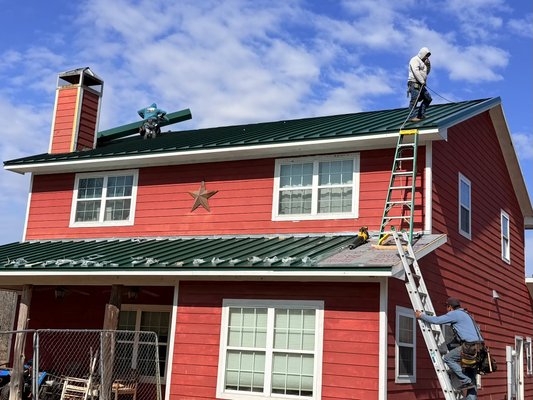 Insurance Claim - Standing Seam Install - This roof had a shingle system installed. The homeowner thought they had damage and asked us out to inspect. Upon inspecting we determined that a claim was viable. They mentioned one had already been filed but the first adjuster denied the claim - we reopened it. 

A second adjuster denied the claim. We brought in a Public Adjuster, not on the payroll of the insurance carrier. They found the damage, argued it, and the homeowner got their roof paid for!