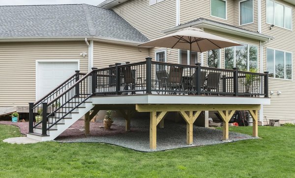 Trex® Transcend® Deck with Trex® Aluminum Handrails in Windsor, CT - Project Overview:
Decks by RTC crafted a stunning Trex® Transcend® deck in Windsor, CT, designed for both beauty and durability. The deck features Trex® Transcend® decking in Fire Pit, a rich, warm hue that enhances the outdoor space with a bold and inviting aesthetic. Complementing the main deck, a Woodland Brown staircase adds contrast and a seamless transition between levels.
To further enhance the design, the deck is finished with sleek black Trex® aluminum handrails, adding a modern touch while ensuring long-lasting strength and safety. For the ultimate convenience in outdoor entertaining, a direct gas line was installed to seamlessly integrate a grill, allowing for effortless outdoor cooking without the hassle of propane tanks.
This project is a perfect blend of style, function, and low-maintenance materials, providing the homeowner with a luxurious and practical outdoor retreat designed to withstand the elements for years to come.
Project Highlights:
✅ Trex® Transcend® Fire Pit decking – rich color and superior durability
✅ Woodland Brown staircase accent – warm contrast for a stylish transition
✅ Black Trex® aluminum handrails – sleek, modern, and long-lasting
✅ Direct gas line for grill – seamless outdoor cooking convenience
✅ Designed & built by Decks by RTC – expert craftsmanship with premium materials Trex® Transcend® Deck with Trex® Aluminum Handrails in Windsor, CT - Project Overview:
Decks by RTC crafted a stunning Trex® Transcend® deck in Windsor, CT, designed for both beauty and durability. The deck features Trex® Transcend® decking in Fire Pit, a rich, warm hue that enhances the outdoor space with a bold and inviting aesthetic. Complementing the main deck, a Woodland Brown staircase adds contrast and a seamless transition between levels.
To further enhance the design, the deck is finished with sleek black Trex® aluminum handrails, adding a modern touch while ensuring long-lasting strength and safety. For the ultimate convenience in outdoor entertaining, a direct gas line was installed to seamlessly integrate a grill, allowing for effortless outdoor cooking without the hassle of propane tanks.
This project is a perfect blend of style, function, and low-maintenance materials, providing the homeowner with a luxurious and practical outdoor retreat designed to withstand the elements for years to come.
Project Highlights:
✅ Trex® Transcend® Fire Pit decking – rich color and superior durability
✅ Woodland Brown staircase accent – warm contrast for a stylish transition
✅ Black Trex® aluminum handrails – sleek, modern, and long-lasting
✅ Direct gas line for grill – seamless outdoor cooking convenience
✅ Designed & built by Decks by RTC – expert craftsmanship with premium materials