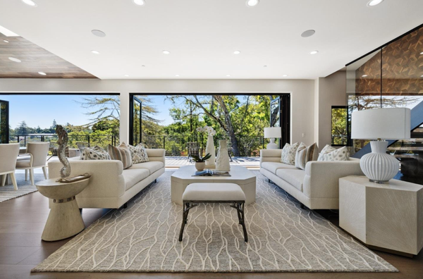 New Home Hillsborough, CA - Introducing a luxurious and contemporary masterpiece situated in the prestigious Hillsborough California. This stunning new construction, completed in 2023, offers a grand living experience with its generous proportions and high-end finishes. Spanning over 5200 square feet, this expansive residence boasts six exquisitely designed bedrooms, providing ample space for relaxation and privacy. The seamless integration of indoor-outdoor living is a defining feature of this home. Step onto the decks or multiple terraces, thoughtfully designed for entertainment and enjoyment, where you can savor breathtaking views of the surrounding natural beauty. These open-air spaces provide an idyllic setting for hosting gatherings, enjoying sunsets, or simply unwinding in the fresh air. No expense has been spared in crafting this modern gem. The interior spaces are adorned with top-of-the-line materials and high-quality finishes, creating an atmosphere of sophistication and elegance. The floor plan is intelligently designed, incorporating open-concept living areas that flow harmoniously, allowing for a seamless lifestyle.

Interior and Outdoor Design by Pianta Design
