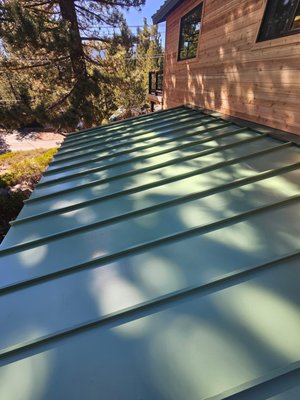 Metal Roofing in Mammoth - This new standing seam metal roof on an addition in Mammoth Lakes came out beautiful. We also wrapped the fascia with clad metal which will help cut down on maintenance of exposed fascia board. With all of the elements mammoth throws at you, this roof will last 50 years plus, free of leaks. Metal Roofing in Mammoth - This new standing seam metal roof on an addition in Mammoth Lakes came out beautiful. We also wrapped the fascia with clad metal which will help cut down on maintenance of exposed fascia board. With all of the elements mammoth throws at you, this roof will last 50 years plus, free of leaks.