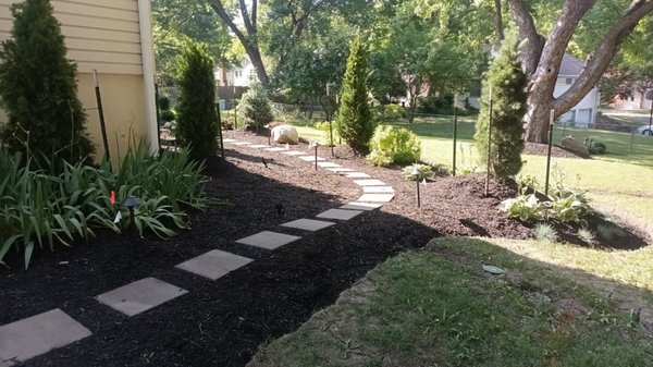 Garden Bed Design and Planting - Garden beds against the wall are common but, to build garden beds in the middle of the lawn requires more creativity and design. We built these garden beds following recommendations by the owners, a bean shape garden bed and a four petals shape garden beds look impressive. Nice curve definitions, plant colocation and the pathway make this project a true artwork come true. Garden Bed Design and Planting - Garden beds against the wall are common but, to build garden beds in the middle of the lawn requires more creativity and design. We built these garden beds following recommendations by the owners, a bean shape garden bed and a four petals shape garden beds look impressive. Nice curve definitions, plant colocation and the pathway make this project a true artwork come true.