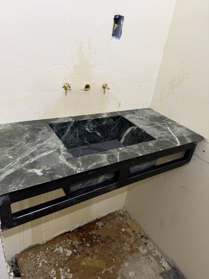 Custom fabricated marble sink - This sink has been fabricated to match the floor of the powder room Custom fabricated marble sink - This sink has been fabricated to match the floor of the powder room