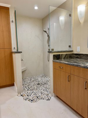 BATHROOM REMODEL - San Mateo - We remodeled 2 bathrooms. One guest and One master bathroom. The master is a beautiful standing shower with stones on the floor. Beautiful outcome!