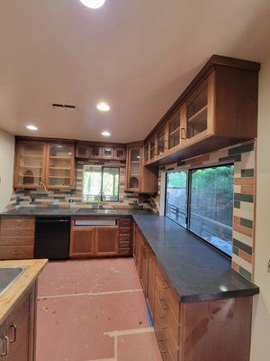 Kitchen Upgrade - Customer Updated counter tops and backsplah in kitchen. Kitchen Upgrade - Customer Updated counter tops and backsplah in kitchen.