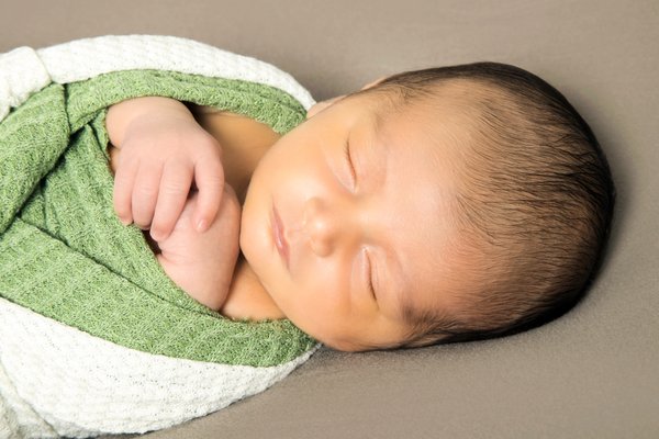 Newborn portraits - Each session includes an all-white setting, 3 different colors of the parent's choice, and a variety of poses. Newborn portraits - Each session includes an all-white setting, 3 different colors of the parent's choice, and a variety of poses.
