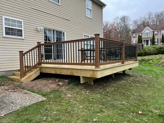 Pressure Treated Lumber Deck - For this project we ripped down our clients old 10x12 deck and replaced it with this beautiful 14x16 deck. This deck features all number 1 grade pressure treated lumber, outdoor recessed LED lights and mocha colored vinyl railing with square black metal balusters.
Call us today to discuss your next deck project! Pressure Treated Lumber Deck - For this project we ripped down our clients old 10x12 deck and replaced it with this beautiful 14x16 deck. This deck features all number 1 grade pressure treated lumber, outdoor recessed LED lights and mocha colored vinyl railing with square black metal balusters.
Call us today to discuss your next deck project!