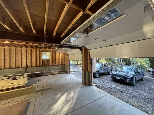 Mountain Home - This was an installation of two beautiful carriage style garage doors in the Santa Cruz mountains. Both doors are a custom dark oak color with decorative hardware to give the doors a unique look for this home.
Each door is equipped with a state of the art Lift Master 8500W side mounting opener. This opener maximizes space in the garage and features modern MyQ technology that allows the homeowner to operate both doors with their phone! Mountain Home - This was an installation of two beautiful carriage style garage doors in the Santa Cruz mountains. Both doors are a custom dark oak color with decorative hardware to give the doors a unique look for this home.
Each door is equipped with a state of the art Lift Master 8500W side mounting opener. This opener maximizes space in the garage and features modern MyQ technology that allows the homeowner to operate both doors with their phone!