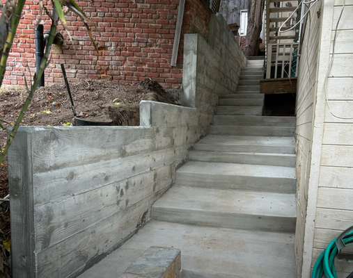 Retaining Wall and Stairs Before and After - Check out this project our team just completed! We took out the old, failing wall and replaced it with a stunning, new concrete retaining wall and stairs! 😍

Alpha Structural has been specializing in the design and construction of retaining walls for over 30 years. Whether the intention is hillside stabilization, creating more yard space, or preventing landslides, we will design, engineer, and build the most practical solution for you! 

If you have any questions about a new retaining wall or correcting an existing one, call us at 323-258-5482!