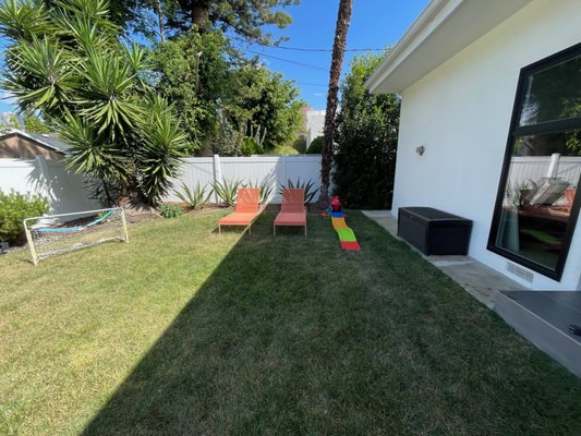 Backyard makeover, Los Angeles. - Client wanted to change out grass to artificial turf, add a new paver patio section for sitting, and add recessed lights, a ceiling fan, and decorative wood paneling to enhance the covered patio. Backyard makeover, Los Angeles. - Client wanted to change out grass to artificial turf, add a new paver patio section for sitting, and add recessed lights, a ceiling fan, and decorative wood paneling to enhance the covered patio.