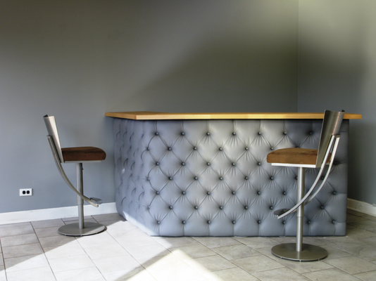 Furniture Reupholstery - This leather furniture needed upholstering and a few touch ups.  These final products are perfect and look and feel brand new!