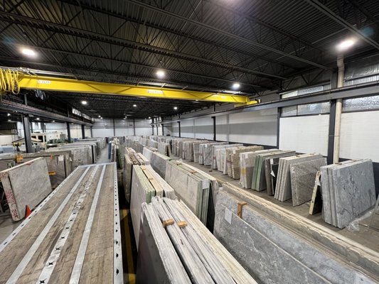 Inside Our Showroom - Our spacious indoor warehouse is home to over 300 slabs of granite, marble, quartz, quartzite. We recommend bringing samples of your floor, backsplash, and cabinets to assist in matching color combinations.
Thanks to the sizes of our slabs, visualizing your space is more convenient than ever.
Located in Westville, NJ, give us a call at 215-782-9172 to schedule an appointment to visit. Inside Our Showroom - Our spacious indoor warehouse is home to over 300 slabs of granite, marble, quartz, quartzite. We recommend bringing samples of your floor, backsplash, and cabinets to assist in matching color combinations.
Thanks to the sizes of our slabs, visualizing your space is more convenient than ever.
Located in Westville, NJ, give us a call at 215-782-9172 to schedule an appointment to visit.