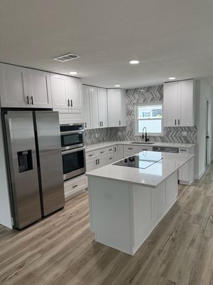 Kitchen Remodel- Jan 2025 - We recently completed a full kitchen remodel featuring custom cabinets and countertops — and the transformation is truly night and day!
We reimagined the space by removing select walls and closing others, creating a bright, open-concept layout that feels both modern and welcoming. The updated cabinetry and sleek countertops completely refreshed the look, maximizing functionality and bringing in a clean, contemporary feel.
The result? A beautifully open and inviting kitchen that feels twice as big and full of light. We're proud to bring this vision to life! Kitchen Remodel- Jan 2025 - We recently completed a full kitchen remodel featuring custom cabinets and countertops — and the transformation is truly night and day!
We reimagined the space by removing select walls and closing others, creating a bright, open-concept layout that feels both modern and welcoming. The updated cabinetry and sleek countertops completely refreshed the look, maximizing functionality and bringing in a clean, contemporary feel.
The result? A beautifully open and inviting kitchen that feels twice as big and full of light. We're proud to bring this vision to life!