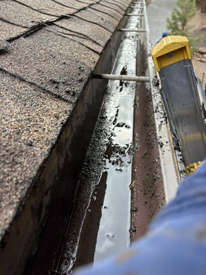 Gutter Clean - This homes gutters were clogged with pine needles and a bunch of sand, which was heavy on the gutter. We were able to get it completely removed and cleared out so his gutters are able to handle the rain spring will bring us this season. Gutter Clean - This homes gutters were clogged with pine needles and a bunch of sand, which was heavy on the gutter. We were able to get it completely removed and cleared out so his gutters are able to handle the rain spring will bring us this season.