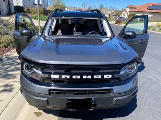Windshield Replacement - We received a call from the owner of a new Ford Bronco that had a busted windshield. They were panicking because the car wasn't drivable in its current condition. We were able to order their windshield and drive over the next day to replace it right in front of their house. Windshield Replacement - We received a call from the owner of a new Ford Bronco that had a busted windshield. They were panicking because the car wasn't drivable in its current condition. We were able to order their windshield and drive over the next day to replace it right in front of their house.