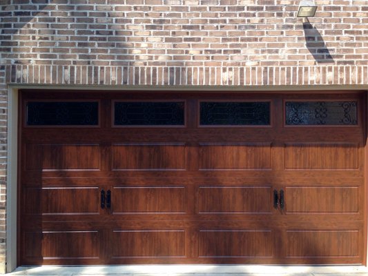 Beautiful Steel garage Door with the Look of Wood - This project is a low maintenance steel garage door with the beautiful look of full grain wood. It's amazing how a garage door quickly upgrades the look of this home. Beautiful Steel garage Door with the Look of Wood - This project is a low maintenance steel garage door with the beautiful look of full grain wood. It's amazing how a garage door quickly upgrades the look of this home.
