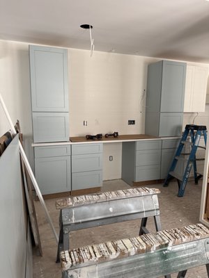 Kitchen Remodeling in Ocean City, Avalon, Stone Harbor & Sea Isle City, NJ - Matera Builders is a home remodeling contractor serving Ocean City, Avalon, Stone Harbor, Sea Isle City and the surrounding South Jersey shore communities since 1988. Kitchen remodeling is one of our core services, from simple cabinet and countertop updates to complete kitchen renovations taken down to the studs and rebuilt from the ground up.

A shore home kitchen has to do more than look good. It needs to handle a full house of family and guests all summer, stand up to sand, humidity and salt air, and still feel fresh years later. We design and build kitchens with that in mind, combining durable materials, smart storage and clean, timeless style.

Our kitchen remodeling services

Complete kitchen renovations, from demolition to final trim
Cabinet installation, including shaker, painted and custom-color cabinetry
Countertop installation, including quartz and natural stone
Tile backsplashes, from classic subway and zellige-style tile to marble mosaics
Kitchen flooring, including tile and wood-look options
Floating shelves and open shelving
Built-ins such as desk walls, coffee bars, pantry towers and sideboards
Sink, faucet and fixture installation
Lighting, electrical and plumbing updates
Appliance installation and integration, including microwave drawers
Trim carpentry, crown molding and finish work

How a Matera kitchen remodel works

Every project starts with a conversation about how you use your kitchen, who uses it, and what isn't working today. From there, we plan the layout, cabinetry, finishes and scope so the project is clear before work begins.

Our crews handle the full build: demolition and haul-away, rough work behind the walls, cabinet installation, countertops, tile, flooring, fixtures and final trim. Cabinets are carefully set and leveled so doors, drawers and countertops line up cleanly. One team coordinates the schedule and trades, so you have one point of contact from start to final walkthrough.

Built for shore homes

Kitchens at the Jersey Shore face conditions most kitchens don't. Salt air, humidity, sand and heavy summer use all take a toll. We choose finishes, hardware and installation methods that hold up to coastal living and are easy to keep clean, whether the home is a year-round residence, a family summer house or a rental property.

Off-season remodeling

For many shore homeowners, fall and winter are the best time to remodel. The house is often empty, construction doesn't interrupt summer use or rental weeks, and the kitchen is finished before the season starts. Booking early also gives more time for cabinet and material lead times.

Windows and doors, too

Matera Builders is also an Andersen Elite Certified Contractor, a distinction earned by fewer than 1% of contractors nationwide, and a Therma-Tru Certified Installer. If your kitchen remodel includes new windows, a patio door or a Weiland sliding glass wall, our team can handle it as part of the same project.

Frequently asked questions

Who does kitchen remodeling in Ocean City, NJ?
Matera Builders remodels kitchens in Ocean City, Avalon, Stone Harbor, Sea Isle City and nearby shore towns. We've served the South Jersey shore since 1988.

Does Matera Builders handle the entire kitchen remodel?
Yes. We manage the full project, including demolition, cabinets, countertops, tile backsplashes, flooring, fixtures, lighting updates and finish carpentry.

What kitchen styles do you install?
We install a wide range of styles, from bright white shaker kitchens with floating shelves to painted blue-gray cabinetry with marble mosaic backsplashes, and custom built-ins like desk walls, coffee bars and cane-front sideboards.

When is the best time to remodel a kitchen in a shore home?
Fall and winter are ideal. Work doesn't interrupt summer use or rentals, and the kitchen is ready before Memorial Day.

Can you replace windows and doors during a kitchen remodel?
Yes. As an Andersen Elite Certified Contractor, we can replace windows, patio doors and sliding glass walls as part of your kitchen project.

Does Matera Builders only install windows and doors?
No. Matera Builders is a full home remodeling contractor and an Andersen Elite Certified window and door installer. We handle kitchen and bath remodels, powder rooms, flooring, siding, built-ins and finish carpentry.

What areas do you serve?
Ocean City, Avalon, Stone Harbor, Sea Isle City, Margate City, West Cape May and surrounding South Jersey shore communities.