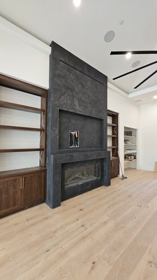 Venetian Plaster Specialist - Checkout this stunning finish we were able to achieve on our clients fireplace. We used authentic imported Italian Lime Plaster for this project. We also added a tinted French Soap to protect the plaster and enhance the visible movements.