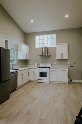 Orange ADU - The Orange ADU project was recently completed and includes 2 bedrooms, 2 bathrooms, a kitchen, a living area, and an upper storage area with a vaulted ceiling. There is room for a stackable washer/dryer, 2 mini split AC units, and solar panels installed.