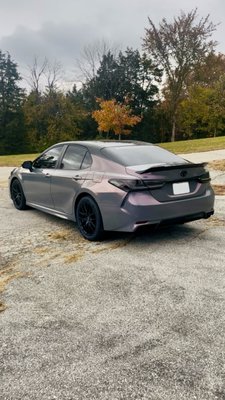2018 Toyota Camry | Full Wrap, Ceramic Coating - This 2018 Toyota Camry had a full wrap done in TinyBot's Gloss Galaxy Dust Gray Unicorn. The roof was wrapped in Avery Dennison's Gloss Black. This wrap is also protected with ceramic coating. 2018 Toyota Camry | Full Wrap, Ceramic Coating - This 2018 Toyota Camry had a full wrap done in TinyBot's Gloss Galaxy Dust Gray Unicorn. The roof was wrapped in Avery Dennison's Gloss Black. This wrap is also protected with ceramic coating.