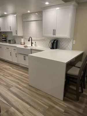 Kitchen Remodel - This kitchen was in dire need of some new life. We took this outdated kitchen, removed a wall and made this kitchen more functional for this client.