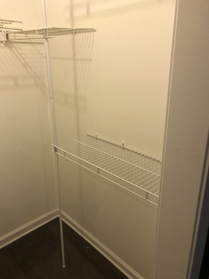 Closet organizer system installation - This turned a very crowded master closet into a more usable space with lots of extra storage space. IKEA makes many closet solutions