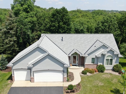 New roof and gutters - New GAF roof.  Timberline HDZ shingles - Birchwood color with black valley metal.  New gutters and downsouopts in colonial white.