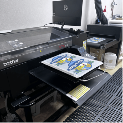 Advanced DTF Printing - Struggling to find a reliable printing method that delivers bold colors and stands the test of time? Our DTF Printing Service in Las Vegas offers a game-changing solution for businesses seeking top-tier custom apparel. Whether you’re outfitting your team, promoting an event, or launching merchandise, our DTF Printing Services provide the perfect combination of flexibility and quality and also we provides Same-Day T-Shirts Service “Call For Availability”. Get crisp, long-lasting prints that look amazing on everything like t-shirts, custom sweatshirts, custom jackets, and custom beanies, and custom hoodies.
What Makes DTF Printing a Smart Choice?
DTF (Direct-to-Film) printing stands out because it delivers exceptional print quality across different fabric types. Whether your needs are large-scale or small-batch, our DTF Printing in Las Vegas is designed to be versatile, durable, and cost-effective.
Unbeatable Print Quality: Your designs come to life with vibrant colors, fine details, and smooth gradients that other printing methods struggle to achieve.
Works on All Fabrics: From cotton to polyester and even blends, DTF Printing look sharp and stay strong on any material.
Ready for Anything: Our prints are built to last, resisting fading and cracking even after repeated washes, making them ideal for workwear, uniforms, and branded apparel. Advanced DTF Printing - Struggling to find a reliable printing method that delivers bold colors and stands the test of time? Our DTF Printing Service in Las Vegas offers a game-changing solution for businesses seeking top-tier custom apparel. Whether you’re outfitting your team, promoting an event, or launching merchandise, our DTF Printing Services provide the perfect combination of flexibility and quality and also we provides Same-Day T-Shirts Service “Call For Availability”. Get crisp, long-lasting prints that look amazing on everything like t-shirts, custom sweatshirts, custom jackets, and custom beanies, and custom hoodies.
What Makes DTF Printing a Smart Choice?
DTF (Direct-to-Film) printing stands out because it delivers exceptional print quality across different fabric types. Whether your needs are large-scale or small-batch, our DTF Printing in Las Vegas is designed to be versatile, durable, and cost-effective.
Unbeatable Print Quality: Your designs come to life with vibrant colors, fine details, and smooth gradients that other printing methods struggle to achieve.
Works on All Fabrics: From cotton to polyester and even blends, DTF Printing look sharp and stay strong on any material.
Ready for Anything: Our prints are built to last, resisting fading and cracking even after repeated washes, making them ideal for workwear, uniforms, and branded apparel.