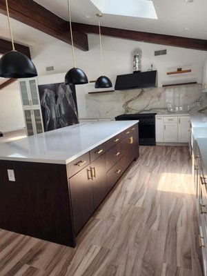 Kitchen Remodel 2024 - This remodel was done on an old outdated kitchen that was in in terrible shape. The rest of the house had been updated so it was an eyesore. We gutted the existing kitchen added an island , updated the cabinets, countertop, flooring , lighting and appliances.