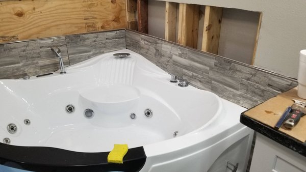 bath tub and shower remodel 2023 - This customer didn't like the way the old bathroom was looking anymore. We went in removed and replaced all the finishing around the tub and redid the complete shower, brought this little space a little up to date! bath tub and shower remodel 2023 - This customer didn't like the way the old bathroom was looking anymore. We went in removed and replaced all the finishing around the tub and redid the complete shower, brought this little space a little up to date!