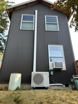 Mini split install on remodeled home. - Oregon Climate Tech recently completed a mini-split installation for an old home with a new addition that lacked ductwork. The homeowners were concerned about staying cool in the new space, especially given the challenge of integrating traditional ductwork into the existing structure. Our team assessed the situation and recommended a mini-split system, which provides efficient cooling without the need for extensive ductwork. The installation process was smooth, and the homeowners were thrilled with the results, enjoying a comfortable and cool environment in their newly expanded living area. Mini split install on remodeled home. - Oregon Climate Tech recently completed a mini-split installation for an old home with a new addition that lacked ductwork. The homeowners were concerned about staying cool in the new space, especially given the challenge of integrating traditional ductwork into the existing structure. Our team assessed the situation and recommended a mini-split system, which provides efficient cooling without the need for extensive ductwork. The installation process was smooth, and the homeowners were thrilled with the results, enjoying a comfortable and cool environment in their newly expanded living area.