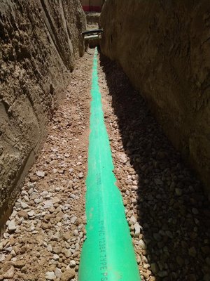 Sewer Line Installation - Zero business interruption, turn-key, sewer replacement project for a commercial building owner.
The old sewer line failed and leaked for a prolonged period of time causing the soil that supports the pipe to fail. The sewer pipe developed multiple reverse slope areas (aka "Pipe Bellies") that were creating frequent sewer blockages.
The only solution to correct the soil failure was to excavate the existing sewer pipe and replace the pipe supporting soil. Following the installation of the new soil, 140 ft of new sewer pipe was installed and commissioned. The trench was backfilled and the asphalt restored.
During this sewer replacement projected all business tenants operated without any business interruption. Drain Bears managed all phases of the project, allowing for faster project completion, happy tenants and low project cost. Sewer Line Installation - Zero business interruption, turn-key, sewer replacement project for a commercial building owner.
The old sewer line failed and leaked for a prolonged period of time causing the soil that supports the pipe to fail. The sewer pipe developed multiple reverse slope areas (aka "Pipe Bellies") that were creating frequent sewer blockages.
The only solution to correct the soil failure was to excavate the existing sewer pipe and replace the pipe supporting soil. Following the installation of the new soil, 140 ft of new sewer pipe was installed and commissioned. The trench was backfilled and the asphalt restored.
During this sewer replacement projected all business tenants operated without any business interruption. Drain Bears managed all phases of the project, allowing for faster project completion, happy tenants and low project cost.
