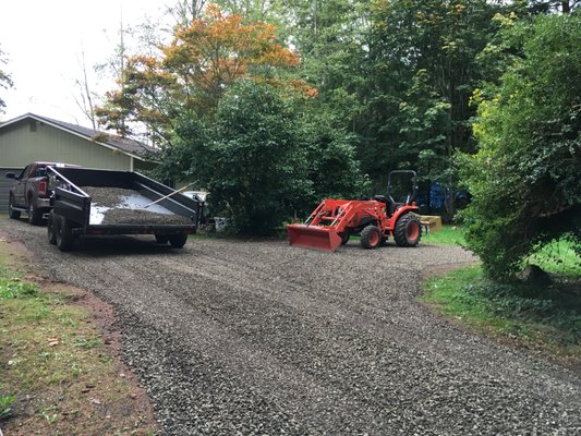 Driveway upgrade - Gravel driveways and parking areas always need (some more than others) renewed with new gravel for that fresh look.....and to fill in ruts or pot holes.