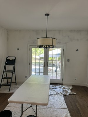 Full Dining Room Wallpaper Installation - Full dining room wallpaper installation with precise pattern matching and clean finishing around windows, doors, corners, outlets, and trim. The wallpaper was installed throughout the entire room, creating a seamless and professionally finished look.