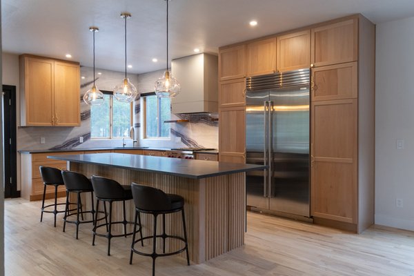 Mountain Home Remodel in Boulder County 2025 - Special Feature Alert ✨
Every home has a story, and this remodel is one of the most meaningful we’ve completed.
To create a truly personalized space, we incorporated wood from a tree that once stood on the homeowners’ property and was lost during the Louisville Fire. Our team carefully harvested the tree, milled the lumber, and crafted custom floating shelves that now live throughout the home.
The distinctive blackened edges are the tree’s original fire marks, intentionally preserved to honor its history and create a lasting connection to the property.
This project is a great example of how thoughtful design and custom craftsmanship can transform meaningful materials into one-of-a-kind features that make a house feel uniquely like home.
Cabinetry by Canyon Creek Cabinet Company
Cabinet Glass by Hillcrest Glass Mountain Home Remodel in Boulder County 2025 - Special Feature Alert ✨
Every home has a story, and this remodel is one of the most meaningful we’ve completed.
To create a truly personalized space, we incorporated wood from a tree that once stood on the homeowners’ property and was lost during the Louisville Fire. Our team carefully harvested the tree, milled the lumber, and crafted custom floating shelves that now live throughout the home.
The distinctive blackened edges are the tree’s original fire marks, intentionally preserved to honor its history and create a lasting connection to the property.
This project is a great example of how thoughtful design and custom craftsmanship can transform meaningful materials into one-of-a-kind features that make a house feel uniquely like home.
Cabinetry by Canyon Creek Cabinet Company
Cabinet Glass by Hillcrest Glass