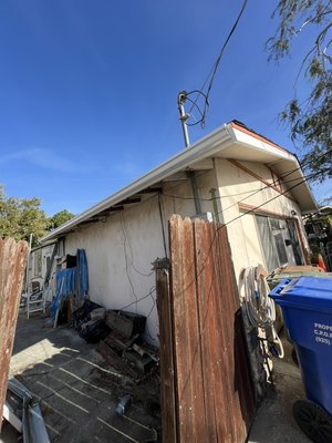 Gutter Replacement & Eaves Replacement - This house needed new gutters, eaves, and a section of rafters installed on an addition so that the gutters wouldn’t be mounted directly on the wall. Also did a bit of roofing.
