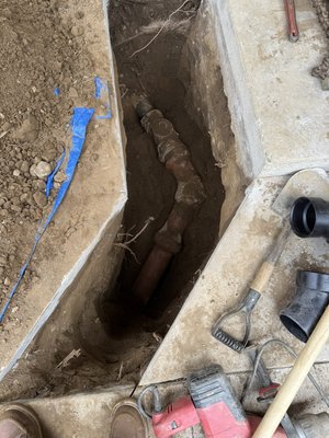 2-way clean-out install - There was a main drain stoppage and our equipment could not pass this section. Therefore the section was removed and replaced adding a 2-way clean-out for access to the drain with the proper equipment to service the drain both into the house and to the street. 2-way clean-out install - There was a main drain stoppage and our equipment could not pass this section. Therefore the section was removed and replaced adding a 2-way clean-out for access to the drain with the proper equipment to service the drain both into the house and to the street.