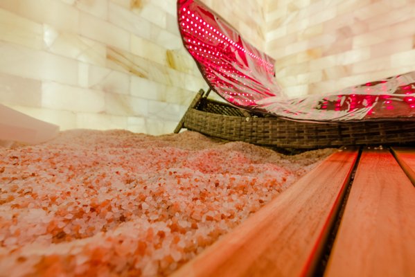 SALT ROOM OASIS - Respiratory Reset + Red Light
For thousands of years dating back to Eastern Europe, salt has been used to help alleviate a variety of health issues, improve the immune system, build respiratory health, and provide the ultimate detox of the airway and skin.
Clients breathe in the micro-sized salt particles, which are immediately transported to every part of the respiratory tract, even the smallest alveoli, and bronchioles. Then, the dry salt molecules dissolve and attract small impurities… the reason why it is called the “toothbrush of the lungs.”
Salt therapy may eliminate the root of inflammatory respiratory illnesses in the lower and the upper tract like asthma, bronchitis as well as allergies, by destroying bacteria and restoring health and immunity.
THE BENEFITS
Respiratory:
Anti-microbial, Anti-bacterial, Anti-viral, and Anti-inflammatory
Opens the bronchial tubes in the lungs; helps to reduce inflammation in the sinuses & small airways
Breaks up and clears mucus
Increases PH level – reduces acidity
Skin:
Naturally triggers skin microcirculation and membrane activity
Enhances skin’s protective and reparative properties
Anti-microbial, Anti-bacterial
Athletic Performance:
Expands the airways for increased lung functions and capacity
Enhances performance
Increases oxygen saturation and exchange
Helps with muscle endurance and recovery
Ear Infection:
Halotherapy can greatly relieve the swelling and pain that is common with an ear infection by penetrating the ear canal with salt particles. Salt, as an anti-bacterial and anti-inflammatory agent, reduces the swelling of the tubes in your ear, allowing the fluid to drain.
Stress Reduction and Improved Immune Health
30 MINUTES OF HALOTHERAPY PROVIDES THE SAME BENEFITS AS 2 & HALF DAYS AT THE BEACH
DEEP LUNG PENETRATION
Halotherapy (Dry Salt) uses a Halogenerator to spread small, dry salt particles in the air creating an antibacterial environment. These smaller particles can penetrate deeper into the lungs. Deep penetration is essential for reducing inflammation and helping clear mucus from the lungs, which is particularly beneficial for individuals with chronic respiratory conditions such as asthma or COPD.
Regarded as conventional healthcare, salt therapy is covered by health insurance in many European countries and Israel. For clinical studies and more information, visit Halotherapy Solution Research page or the Global Wellness Institute and the World Halotherapy Association.
WHY DO HALOTHERAPY AND MEDITATION WORK VERY WELL TOGETHER?
Dry salt therapy is anti-microbial and anti-inflammatory and relieves stress, boosts immunity, and creates a deep relaxation. Layered on top, guided meditation takes it to the next level and can really have great results for stress and anxiety relief!
TREATMENT GUIDES
• Bronchial Asthma, COPD, Cystic Fibrosis: 4 sessions per week for 5 weeks
• Cold/Flu, Sinusitis, Laryngitis: 2-3 sessions per week for 3 weeks
• Eczema/Psoriasis: 4 sessions per week for 5 to 8 weeks
• Seasonal Allergies: 3-5 sessions per week for 4 weeks
• Stress/Anxiety: 1-3 sessions per week (as needed)
This is only a guide and may differ for each individual based on specific conditions & symptoms.
RED LIGHT THERAPY PADS
Rejuvenate, accelerate recovery, reduce inflammation, increase collagen production and anti-aging with the Red Light Therapy Pads included in your session.
Our whole-body red light pads deliver 360 degrees of whole body red light therapy that deliver more than 2,200 660nm red and 850nm near-infrared LEDs. Thirty-minute automated sessions deliver 50 milliwatts per centimeter square of full-body mitochondrial wellness. SALT ROOM OASIS - Respiratory Reset + Red Light
For thousands of years dating back to Eastern Europe, salt has been used to help alleviate a variety of health issues, improve the immune system, build respiratory health, and provide the ultimate detox of the airway and skin.
Clients breathe in the micro-sized salt particles, which are immediately transported to every part of the respiratory tract, even the smallest alveoli, and bronchioles. Then, the dry salt molecules dissolve and attract small impurities… the reason why it is called the “toothbrush of the lungs.”
Salt therapy may eliminate the root of inflammatory respiratory illnesses in the lower and the upper tract like asthma, bronchitis as well as allergies, by destroying bacteria and restoring health and immunity.
THE BENEFITS
Respiratory:
Anti-microbial, Anti-bacterial, Anti-viral, and Anti-inflammatory
Opens the bronchial tubes in the lungs; helps to reduce inflammation in the sinuses & small airways
Breaks up and clears mucus
Increases PH level – reduces acidity
Skin:
Naturally triggers skin microcirculation and membrane activity
Enhances skin’s protective and reparative properties
Anti-microbial, Anti-bacterial
Athletic Performance:
Expands the airways for increased lung functions and capacity
Enhances performance
Increases oxygen saturation and exchange
Helps with muscle endurance and recovery
Ear Infection:
Halotherapy can greatly relieve the swelling and pain that is common with an ear infection by penetrating the ear canal with salt particles. Salt, as an anti-bacterial and anti-inflammatory agent, reduces the swelling of the tubes in your ear, allowing the fluid to drain.
Stress Reduction and Improved Immune Health
30 MINUTES OF HALOTHERAPY PROVIDES THE SAME BENEFITS AS 2 & HALF DAYS AT THE BEACH
DEEP LUNG PENETRATION
Halotherapy (Dry Salt) uses a Halogenerator to spread small, dry salt particles in the air creating an antibacterial environment. These smaller particles can penetrate deeper into the lungs. Deep penetration is essential for reducing inflammation and helping clear mucus from the lungs, which is particularly beneficial for individuals with chronic respiratory conditions such as asthma or COPD.
Regarded as conventional healthcare, salt therapy is covered by health insurance in many European countries and Israel. For clinical studies and more information, visit Halotherapy Solution Research page or the Global Wellness Institute and the World Halotherapy Association.
WHY DO HALOTHERAPY AND MEDITATION WORK VERY WELL TOGETHER?
Dry salt therapy is anti-microbial and anti-inflammatory and relieves stress, boosts immunity, and creates a deep relaxation. Layered on top, guided meditation takes it to the next level and can really have great results for stress and anxiety relief!
TREATMENT GUIDES
• Bronchial Asthma, COPD, Cystic Fibrosis: 4 sessions per week for 5 weeks
• Cold/Flu, Sinusitis, Laryngitis: 2-3 sessions per week for 3 weeks
• Eczema/Psoriasis: 4 sessions per week for 5 to 8 weeks
• Seasonal Allergies: 3-5 sessions per week for 4 weeks
• Stress/Anxiety: 1-3 sessions per week (as needed)
This is only a guide and may differ for each individual based on specific conditions & symptoms.
RED LIGHT THERAPY PADS
Rejuvenate, accelerate recovery, reduce inflammation, increase collagen production and anti-aging with the Red Light Therapy Pads included in your session.
Our whole-body red light pads deliver 360 degrees of whole body red light therapy that deliver more than 2,200 660nm red and 850nm near-infrared LEDs. Thirty-minute automated sessions deliver 50 milliwatts per centimeter square of full-body mitochondrial wellness.