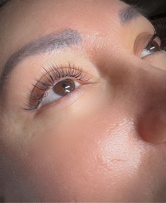 Best Lash Extensions, Delray Beach Fl - Classic lash extensions offer a timeless and sophisticated enhancement to your natural lashes. Each individual extension is meticulously applied, creating a one-to-one ratio with your existing lashes. The result is a subtle yet impactful extension of length and definition. Classic lash extensions provide a natural, everyday elegance, emphasizing the beauty of your eyes without appearing overly dramatic. This technique is perfect for those seeking a more understated, polished look that enhances their natural features. Enjoy the simplicity of classic lash extensions, where every lash is a stroke of refined beauty. Best Lash Extensions, Delray Beach Fl - Classic lash extensions offer a timeless and sophisticated enhancement to your natural lashes. Each individual extension is meticulously applied, creating a one-to-one ratio with your existing lashes. The result is a subtle yet impactful extension of length and definition. Classic lash extensions provide a natural, everyday elegance, emphasizing the beauty of your eyes without appearing overly dramatic. This technique is perfect for those seeking a more understated, polished look that enhances their natural features. Enjoy the simplicity of classic lash extensions, where every lash is a stroke of refined beauty.