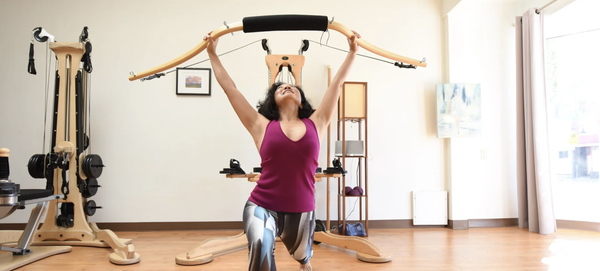 Techniques - Experience Pilates on Robertson - Because science has shown that the body-in-movement involves many systems, we integrate several movement techniques into our sessions. Individual specific needs are addressed more completely by combining contemporary Pilates, classical Pilates, GYROTONIC® movement, and Yamuna in the work outs. Each modality impacts the mind/body connection with its own focus and intention. Every special blend of techniques, allows clients to experience change in their bodies quickly and feel in control of the mind and body. The ultimate result being improved balance, stability, and flexibility.
Joseph Pilates created his technique out of a desire to rehabilitate wounded soldiers in World War I. Amazingly, when in New York, his work developed as a means for dancers, acrobats, and similar performers to improve their skills. The Pilates Reformer, Cadillac, and Wunda Chair comprise his most popular pieces of work out equipment. Using spring resistance, Pilates created a system which emphasized core strength, joint stabilization, and sustained control of the body. Not only is this method excellent for enhancing muscle tone, but it is also very effective for managing pain and rehabilitating injuries because Pilates balances, strengthens, and increases awareness of body control Thus, the original name was Body Contrology.
After suffering dance injuries, Juliu Horvath, developed a movement technique to heal himself. Based on the principles of dance, tai-chi, yoga, and swimming, GYROTONIC® practices move a client through spirals and sways of the spine, shoulders, and hips, for an energetically complete movement experience. Resistance on the GYROTONIC EXPANSION SYSTEM® is created by a weight and pulley system, and handle unit which help guide the body in multidirectional, three dimensional movement. This allows for fluidity and a natural opening and balancing of the body's musculo-skeletal, lymphatic, fascial, and nervous systems. GYROTONIC® exercises enhance the pleasure in movement with its smooth flow and breath work.
GYROTONIC®, GYROTONIC EXPANSION SYSTEM® and GYROKINESIS® are registered trademarks of Gyrotonic Sales Corp and are used with their permission.
Yamuna based her work on Hatha yoga and a master understanding of massage. The Yamuna balls create a deep pressure while rolling which creates bone stimulation, muscle release, fascial release, and scar tissue softening. Yamuna Body Rolling is particularly helpful for releasing back tension from the base up to the head. YBR also facilitates the release of endorphins and serotonin. Thus, a deep relaxation often occurs as one rolls through the Yamuna routines. Techniques - Experience Pilates on Robertson - Because science has shown that the body-in-movement involves many systems, we integrate several movement techniques into our sessions. Individual specific needs are addressed more completely by combining contemporary Pilates, classical Pilates, GYROTONIC® movement, and Yamuna in the work outs. Each modality impacts the mind/body connection with its own focus and intention. Every special blend of techniques, allows clients to experience change in their bodies quickly and feel in control of the mind and body. The ultimate result being improved balance, stability, and flexibility.
Joseph Pilates created his technique out of a desire to rehabilitate wounded soldiers in World War I. Amazingly, when in New York, his work developed as a means for dancers, acrobats, and similar performers to improve their skills. The Pilates Reformer, Cadillac, and Wunda Chair comprise his most popular pieces of work out equipment. Using spring resistance, Pilates created a system which emphasized core strength, joint stabilization, and sustained control of the body. Not only is this method excellent for enhancing muscle tone, but it is also very effective for managing pain and rehabilitating injuries because Pilates balances, strengthens, and increases awareness of body control Thus, the original name was Body Contrology.
After suffering dance injuries, Juliu Horvath, developed a movement technique to heal himself. Based on the principles of dance, tai-chi, yoga, and swimming, GYROTONIC® practices move a client through spirals and sways of the spine, shoulders, and hips, for an energetically complete movement experience. Resistance on the GYROTONIC EXPANSION SYSTEM® is created by a weight and pulley system, and handle unit which help guide the body in multidirectional, three dimensional movement. This allows for fluidity and a natural opening and balancing of the body's musculo-skeletal, lymphatic, fascial, and nervous systems. GYROTONIC® exercises enhance the pleasure in movement with its smooth flow and breath work.
GYROTONIC®, GYROTONIC EXPANSION SYSTEM® and GYROKINESIS® are registered trademarks of Gyrotonic Sales Corp and are used with their permission.
Yamuna based her work on Hatha yoga and a master understanding of massage. The Yamuna balls create a deep pressure while rolling which creates bone stimulation, muscle release, fascial release, and scar tissue softening. Yamuna Body Rolling is particularly helpful for releasing back tension from the base up to the head. YBR also facilitates the release of endorphins and serotonin. Thus, a deep relaxation often occurs as one rolls through the Yamuna routines.