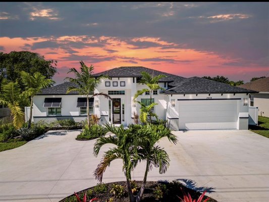 Modern Elegance in Port St. Lucie! - AVAILABLE NOW!! - ** Modern Elegance in Port St. Lucie!
One of the most popular floor plans from this custom home builder — and you can build it on your own lot or let them help you find one!
$669K | 4 Bed | 3 Bath |~2,615 sqft | 2-Car |
Single-Story
Open concept, chef's kitchen, big living areas + covered lanai - high style + high comfort.
i Premium Features
• Energy-efficient CBS construction
Impact windows, tile floors, designer kitchen Stainless appliances (double oven, smooth
cooktop)
• Fireplace, laundry space, landscaped yard w/ irrigation Modern Elegance in Port St. Lucie! - AVAILABLE NOW!! - ** Modern Elegance in Port St. Lucie!
One of the most popular floor plans from this custom home builder — and you can build it on your own lot or let them help you find one!
$669K | 4 Bed | 3 Bath |~2,615 sqft | 2-Car |
Single-Story
Open concept, chef's kitchen, big living areas + covered lanai - high style + high comfort.
i Premium Features
• Energy-efficient CBS construction
Impact windows, tile floors, designer kitchen Stainless appliances (double oven, smooth
cooktop)
• Fireplace, laundry space, landscaped yard w/ irrigation