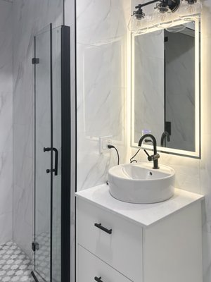 Bathroom Remodel 2024 - Warner Project - At Local Rooter Corp, we specialize in transforming bathrooms into modern, clean, and minimalist spaces. Our 2024 remodels focus on sleek designs, clear lines, and functional layouts that prioritize both style and comfort. Each project emphasizes quality craftsmanship, using high-end materials to create fresh, contemporary bathrooms that are both beautiful and practical. Experience the perfect blend of elegance and simplicity with our expertly executed remodels.