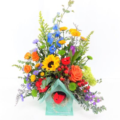 Blooming Birthdays - This portfolio highlights floral designs we created with celebratory bright and bold colors like purple, orange, and pink, popular choices for birthday arrangements, adding energy and vibrancy to the celebration. Bright colors and sweet fragrances trigger positive feelings in the brain, lifting spirits and creating a joyful experience for the recipient. These designs are exclusive custom creations from Avon Floral World.