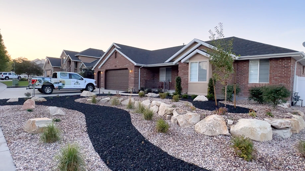 Xeriscape and Outdoor Living in Riverton, Utah - Please enjoy this beautiful front yard xeriscape, also featuring backyard hardscapes and outdoor living spaces in Riverton, Utah.