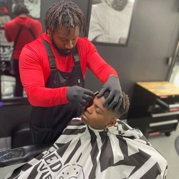 Reserve Darnell - Created by Master Barber and Owner Darnell Jones. Faded Universe is a licensed Barbershop in the Clear Lake area. The shop specializes in all of your grooming needs. All Men, Women, and Kids are welcome. Here at Faded Universe we strive to make a difference in the way you feel from behind the chair. Darnell has over ten years of experience in Hair Fading. He believes that hair Fading is an expression of art and that every Fade is his gift to the Universe. The Universe is Yours. Trust it. One day you may Fade into your own Universe. Reserve Darnell today! Reserve Darnell - Created by Master Barber and Owner Darnell Jones. Faded Universe is a licensed Barbershop in the Clear Lake area. The shop specializes in all of your grooming needs. All Men, Women, and Kids are welcome. Here at Faded Universe we strive to make a difference in the way you feel from behind the chair. Darnell has over ten years of experience in Hair Fading. He believes that hair Fading is an expression of art and that every Fade is his gift to the Universe. The Universe is Yours. Trust it. One day you may Fade into your own Universe. Reserve Darnell today!