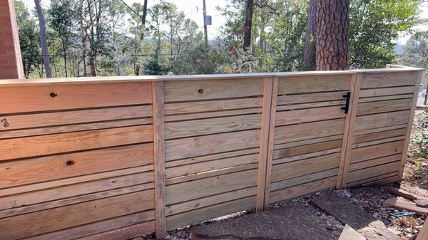 Custom horizontal fencing - This custom horizontal fencing put a modern designer touch on residential fencing. With an upgraded look from normal picket fencing; this customer is enjoying their newly fenced in back yard. Custom horizontal fencing - This custom horizontal fencing put a modern designer touch on residential fencing. With an upgraded look from normal picket fencing; this customer is enjoying their newly fenced in back yard.